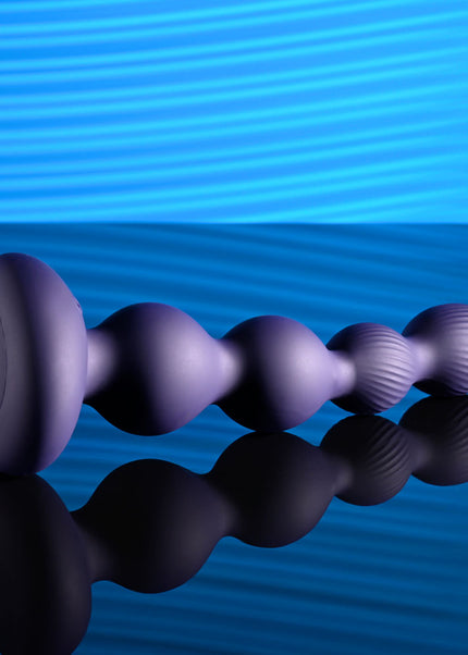 Evolved PLEASURE ORBIT - Navy Blue 17.8 cm USB Rechargeable Twirling & Vibrating Anal Beads with Remote