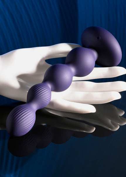 Evolved PLEASURE ORBIT - Navy Blue 17.8 cm USB Rechargeable Twirling & Vibrating Anal Beads with Remote